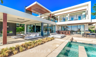 Se vende villa moderna y arquitectónica con vistas panorámicas al mar en un complejo de golf de cinco estrellas en Marbella - Benahavis 791732 