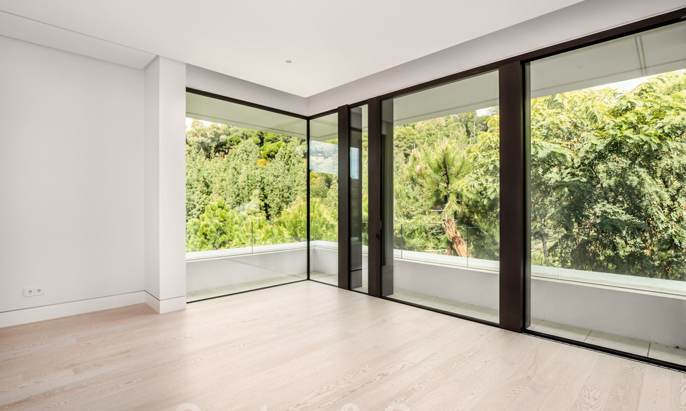 Villa de lujo super moderna y arquitectónica en venta en una exclusiva urbanización de Marbella - Benahavis 40406