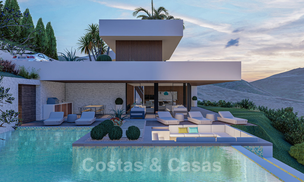 Villa contemporánea y moderna en venta, ubicada en un entorno natural, con impresionantes vistas al valle y al mar, en un complejo cerrado en Benahavis - Marbella 40517