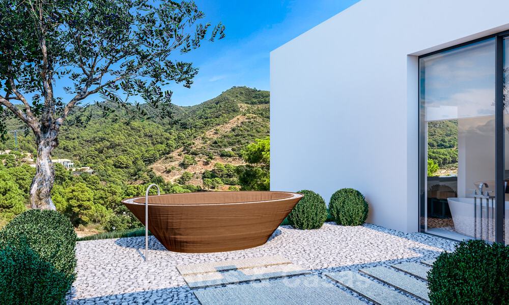 Villa contemporánea y moderna en venta, ubicada en un entorno natural, con impresionantes vistas al valle y al mar, en un complejo cerrado en Benahavis - Marbella 40523
