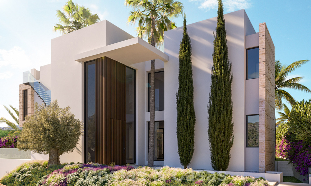 Lujosas villas de nueva construcción en venta, con vistas al mar, en una comunidad cerrada, a poca distancia de la playa, en la Milla de Oro de Marbella 41148