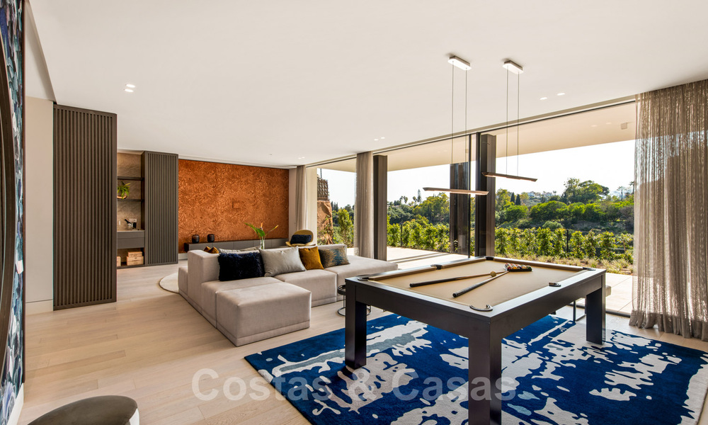 Amplia villa moderna en venta con espectaculares vistas al mar en una comunidad cerrada en Benahavis - Marbella 40679