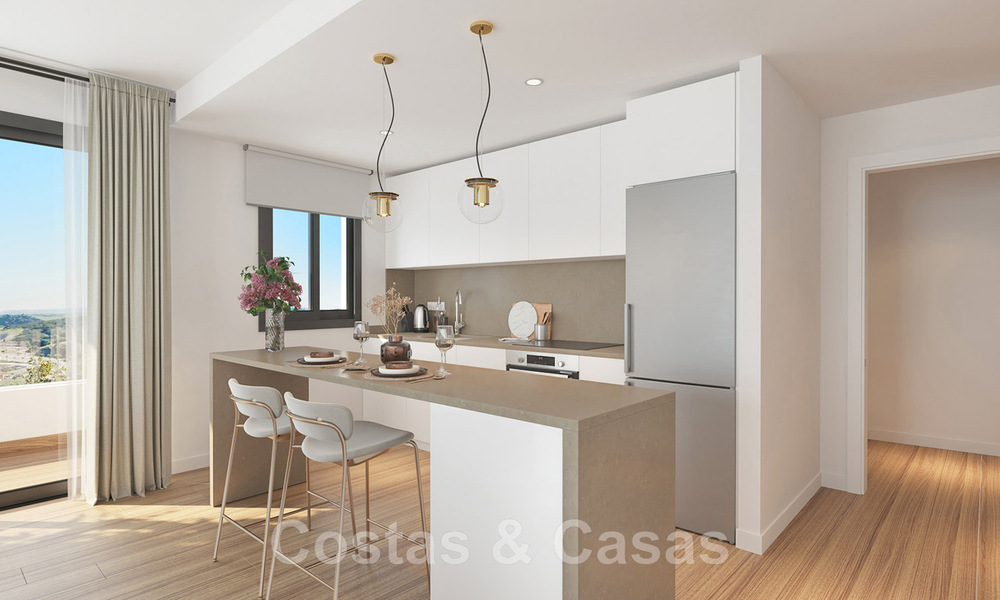 Se venden lujosos apartamentos nuevos de estilo contemporáneo con amplia terraza y vistas panorámicas al mar en Estepona centro 44292