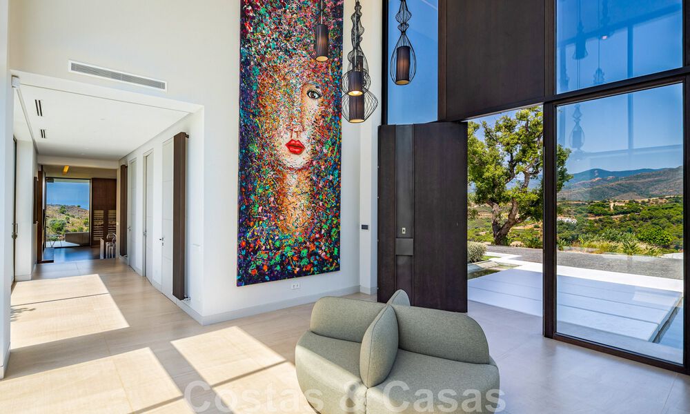 Fenomenal villa de lujo contemporánea en venta, directamente en el campo de golf con vistas al mar en un resort de golf en Marbella - Benahavis 43984