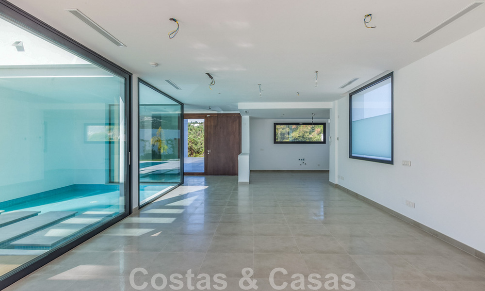 Villa nueva y contemporánea en venta con vistas abiertas a los campos de golf del codiciado resort La Cala Golf, Mijas 44644