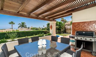 Amplia villa de lujo en venta, de estilo andaluz situada en una posición alta en Nueva Andalucía, Marbella 45145 