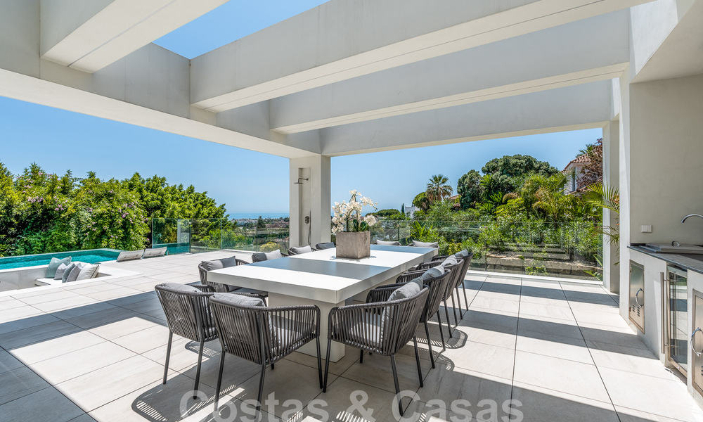 Nueva villa de diseño modernista en venta con vistas panorámicas, situada en la Nueva Milla de Oro de Marbella - Benahavís 53673