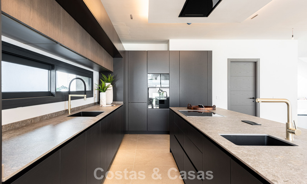 Elegantes y modernas villas de nueva construcción en venta con vistas panorámicas cerca del golf en el valle de Mijas en la Costa del Sol 797830