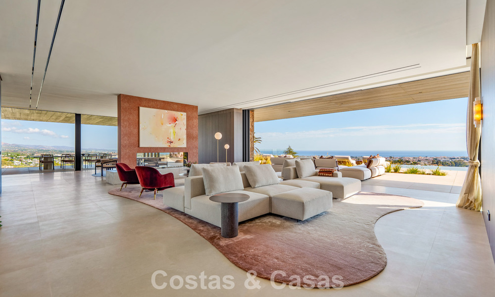 Majestuosa y contemporánea villa de nueva construcción en venta con sublimes vistas al mar en las colinas de La Quinta en Benahavis - Marbella 786696