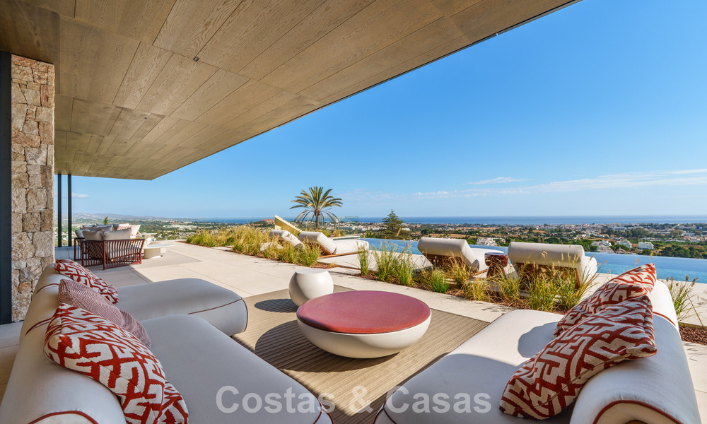 Majestuosa y contemporánea villa de nueva construcción en venta con sublimes vistas al mar en las colinas de La Quinta en Benahavis - Marbella 786705