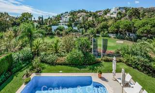 Encantadora villa andaluza en venta con tranquilas vistas al campo de golf en la codiciada zona residencial de La Quinta, Benahavís - Marbella 47696 