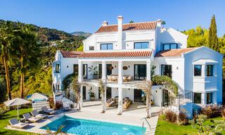 Exquisita villa de lujo en venta de estilo mediterráneo con diseño contemporáneo en una posición elevada en El Madroñal, Benahavis - Marbella 48111 