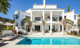 Exquisita villa de lujo en venta de estilo mediterráneo con diseño contemporáneo en una posición elevada en El Madroñal, Benahavis - Marbella 48116 