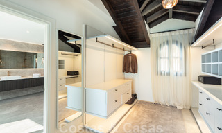 Exquisita villa de lujo en venta de estilo mediterráneo con diseño contemporáneo en una posición elevada en El Madroñal, Benahavis - Marbella 48155 