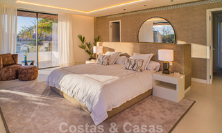 Villa contemporánea de nueva construcción en venta con vistas al mar, situada a poca distancia de la playa en la Milla de Oro de Marbella 50082 