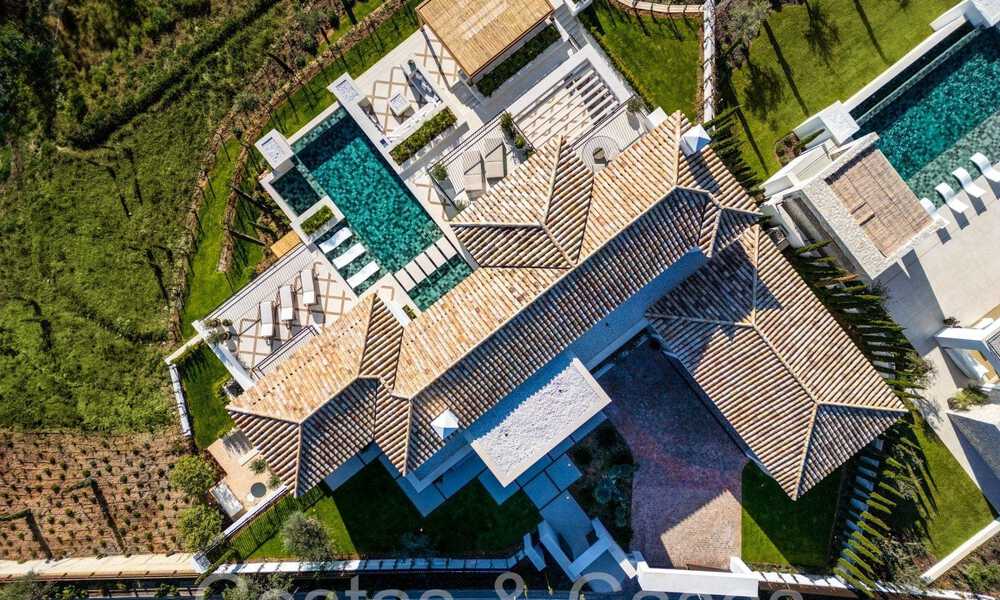 Amplia villa de lujo en venta con impresionantes vistas al mar en una comunidad cerrada prominente en La Quinta en Benahavis - Marbella 63897