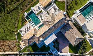 Amplia villa de lujo en venta con impresionantes vistas al mar en una comunidad cerrada prominente en La Quinta en Benahavis - Marbella 63897 