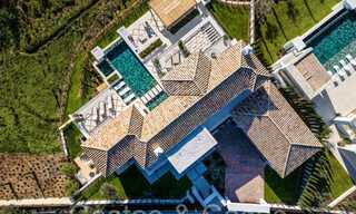 Amplia villa de lujo en venta con impresionantes vistas al mar en una comunidad cerrada prominente en La Quinta en Benahavis - Marbella 63897 