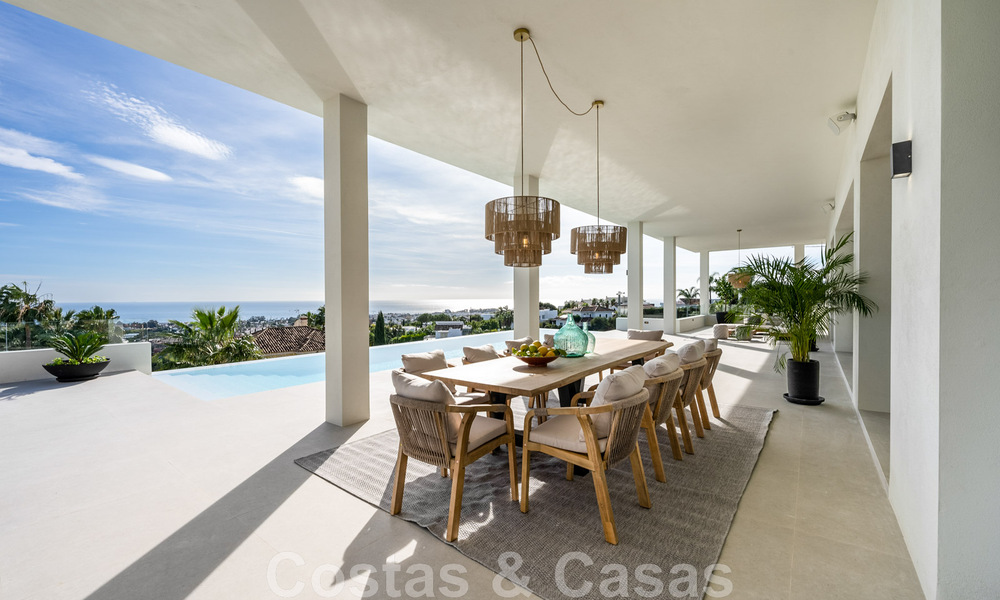 Exclusiva villa de diseño con vistas panorámicas al mar en venta en un resort de golf de cinco estrellas en Marbella - Benahavis 48851