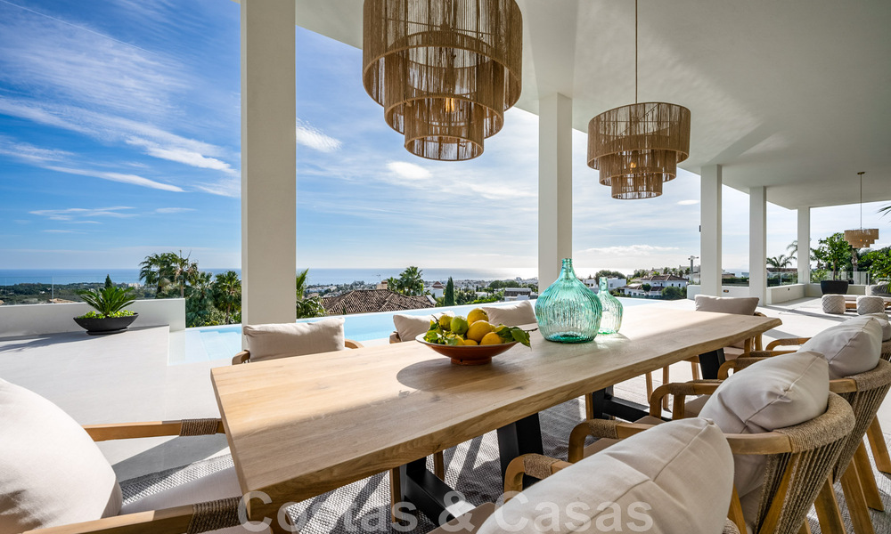 Exclusiva villa de diseño con vistas panorámicas al mar en venta en un resort de golf de cinco estrellas en Marbella - Benahavis 48852