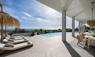 Exclusiva villa de diseño con vistas panorámicas al mar en venta en un resort de golf de cinco estrellas en Marbella - Benahavis 48853 