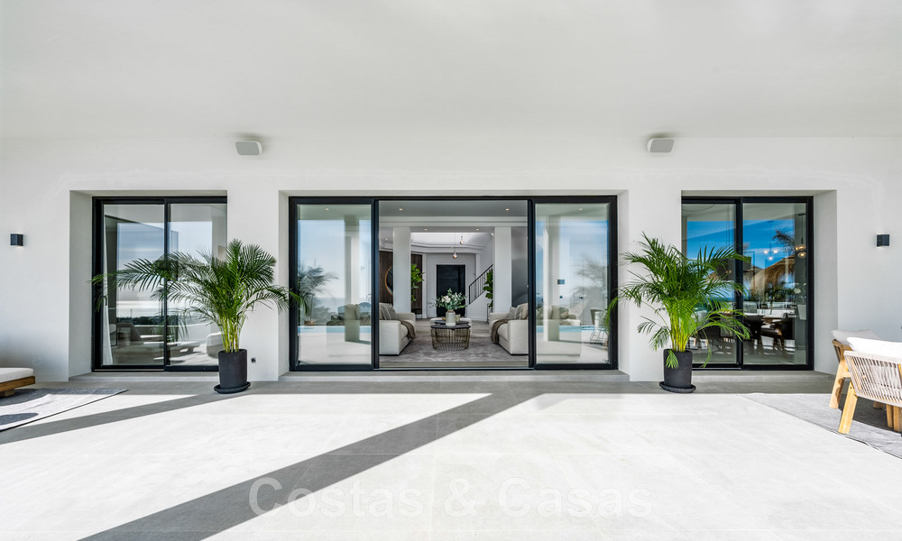 Exclusiva villa de diseño con vistas panorámicas al mar en venta en un resort de golf de cinco estrellas en Marbella - Benahavis 48855