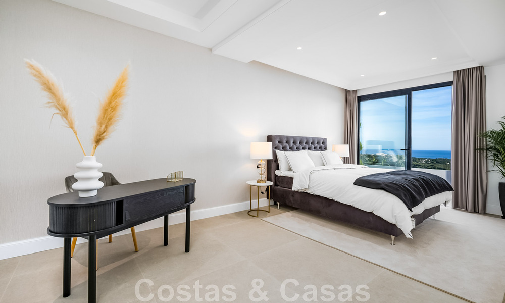 Exclusiva villa de diseño con vistas panorámicas al mar en venta en un resort de golf de cinco estrellas en Marbella - Benahavis 48890