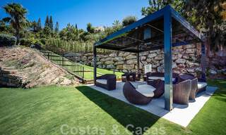 Elegante villa de lujo en venta en una urbanización cerrada en La Quinta, Benahavis - Marbella 50387 