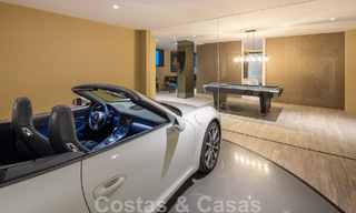 Villa de lujo contemporánea en venta con vistas panorámicas a la montaña y al mar, en el corazón de la Milla de Oro de Marbella 49910 