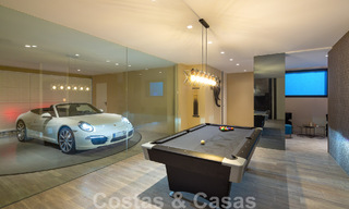 Villa de lujo contemporánea en venta con vistas panorámicas a la montaña y al mar, en el corazón de la Milla de Oro de Marbella 49911 