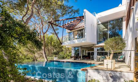 Espaciosa casa adosada de diseño contemporáneo en venta en Sierra Blanca en la Milla de Oro de Marbella 52564
