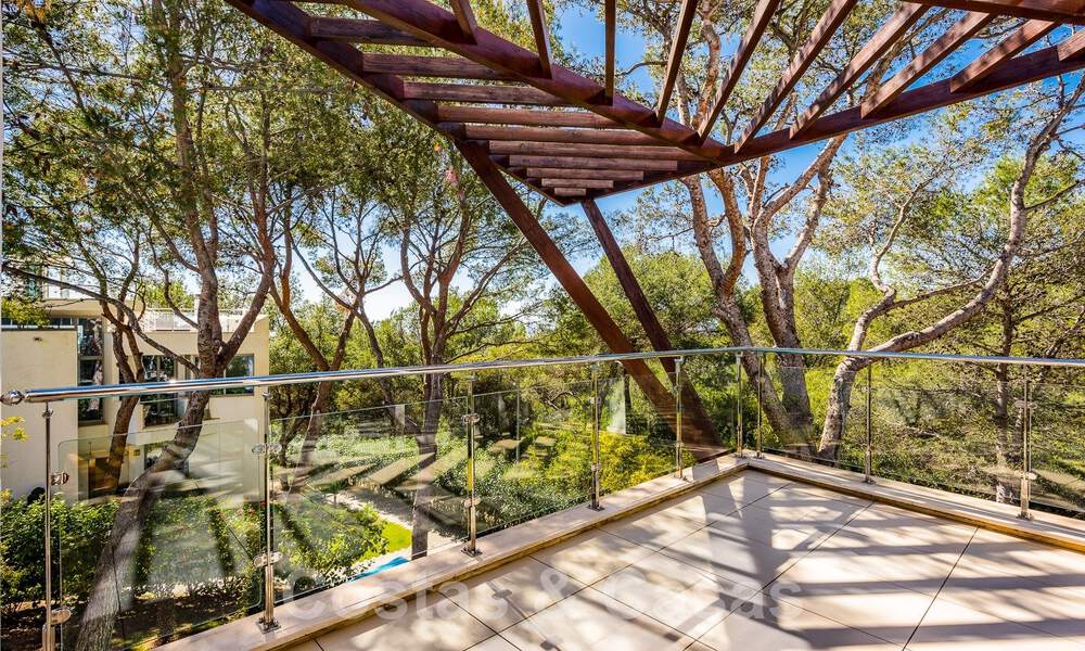 Espaciosa casa adosada de diseño contemporáneo en venta en Sierra Blanca en la Milla de Oro de Marbella 52584