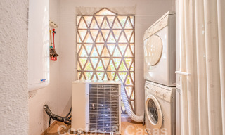 Apartamento con jardín en venta a poca distancia de Puerto Banús y la playa en una urbanización cerrada en Nueva Andalucía, Marbella 55195 