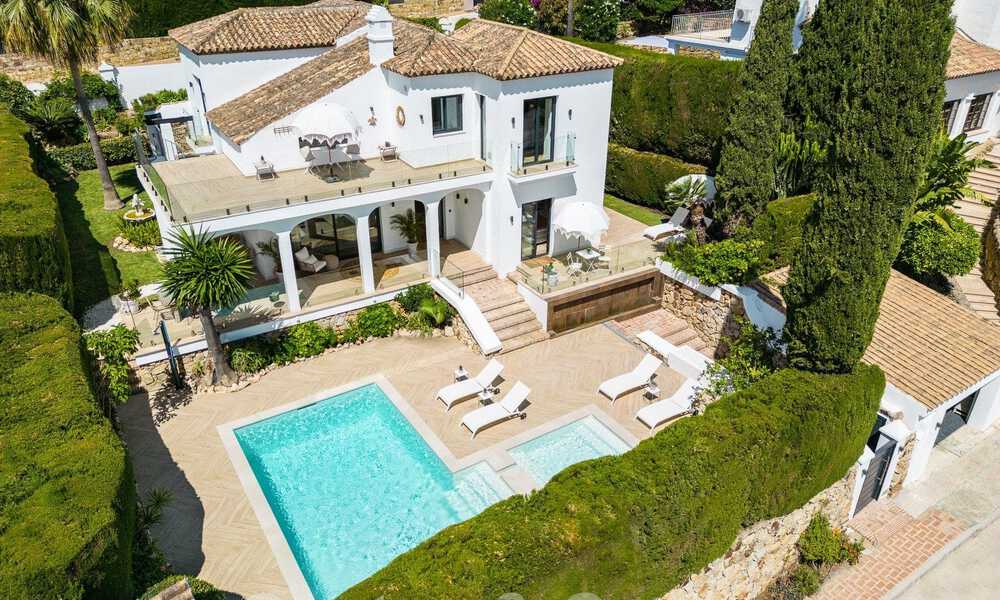 Lujosa villa en venta con un estilo arquitectónico tradicional situada en una urbanización cerrada de Nueva Andalucia, Marbella 53695