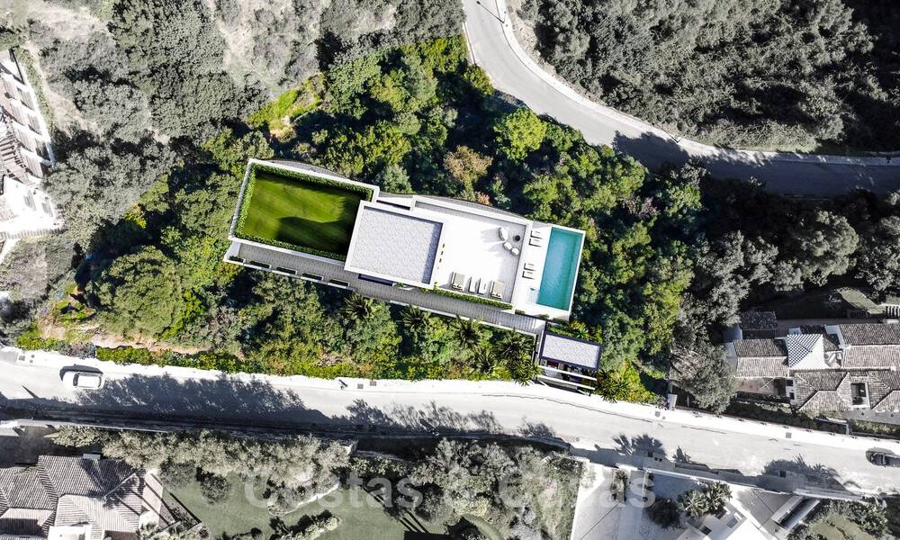 Villa de lujo vanguardista de diseño ultramoderno en venta con impresionantes vistas al mar y a la montaña en Benahavis - Marbella 52071