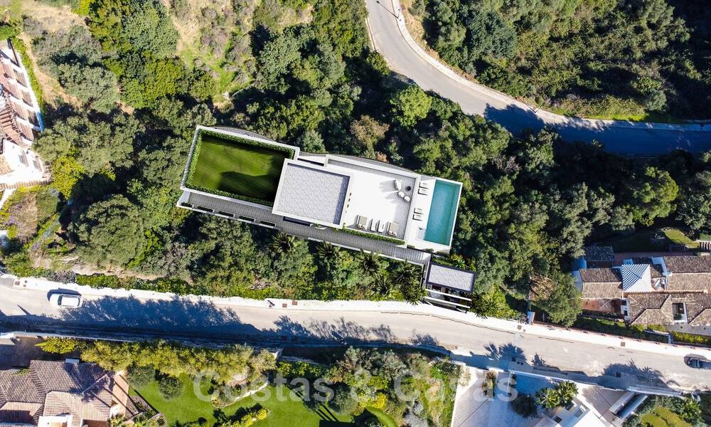 Villa de lujo vanguardista de diseño ultramoderno en venta con impresionantes vistas al mar y a la montaña en Benahavis - Marbella 52072