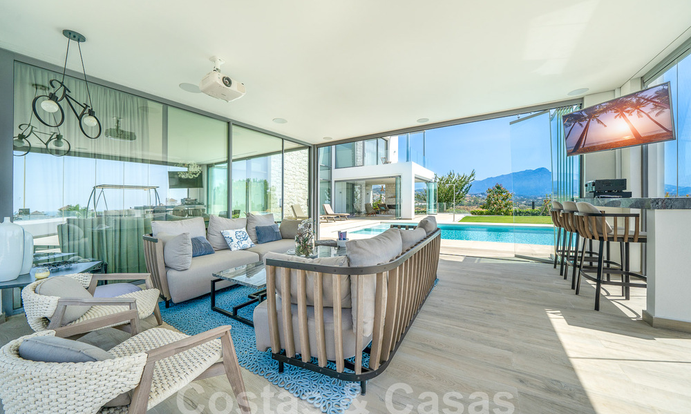 Moderna villa de lujo en venta con impresionantes vistas al mar en una zona exclusiva de Benahavis - Marbella 53353