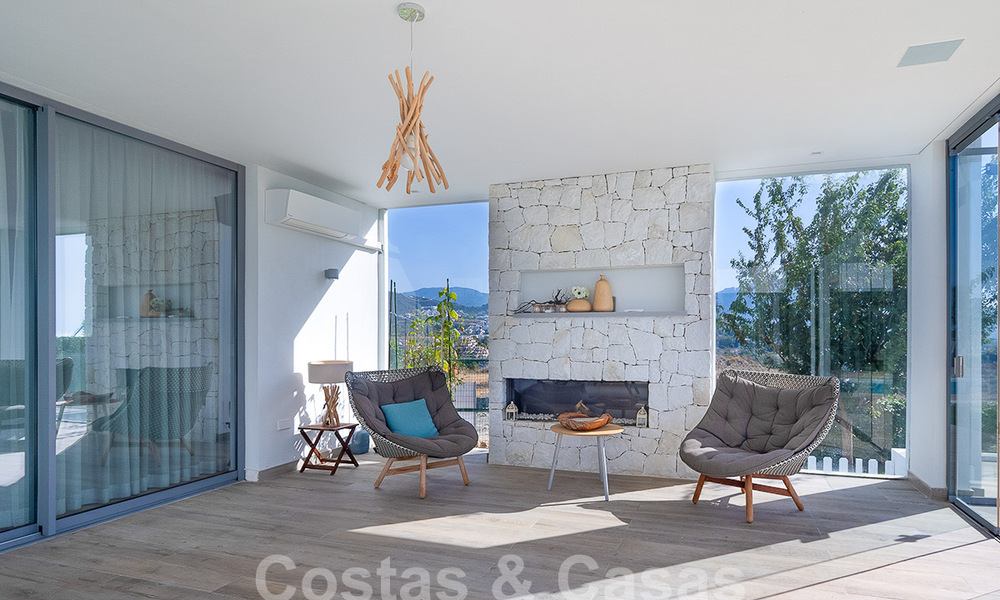 Moderna villa de lujo en venta con impresionantes vistas al mar en una zona exclusiva de Benahavis - Marbella 53359
