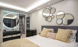 Apartamento de lujo de 4 dormitorios en venta en exclusivo complejo en segunda línea de playa en Puerto Banús, Marbella 52118 