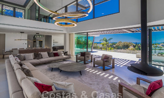 Nueva y moderna villa de lujo de 6 dormitorios en venta con vistas al mar en La Quinta, Marbella - Benahavis 54303 