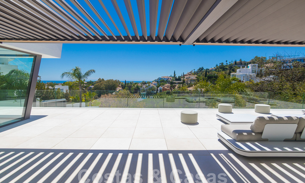 Nueva y moderna villa de lujo de 6 dormitorios en venta con vistas al mar en La Quinta, Marbella - Benahavis 54306