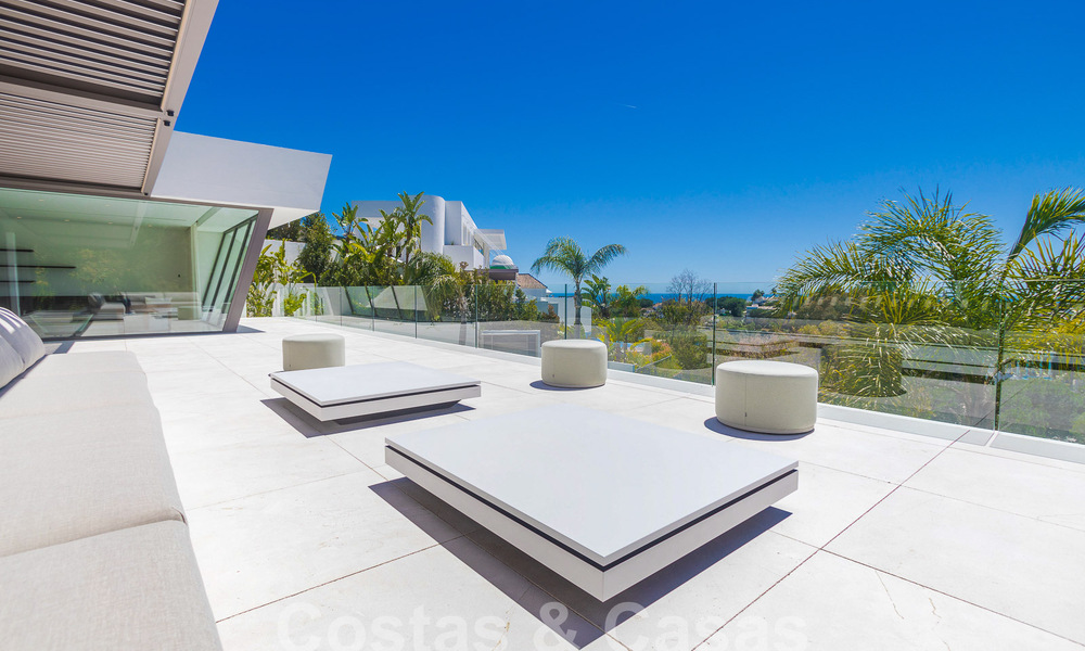 Nueva y moderna villa de lujo de 6 dormitorios en venta con vistas al mar en La Quinta, Marbella - Benahavis 54307