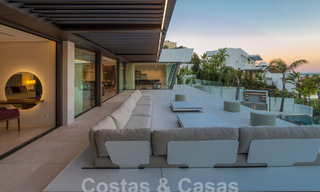 Nueva y moderna villa de lujo de 6 dormitorios en venta con vistas al mar en La Quinta, Marbella - Benahavis 54315 