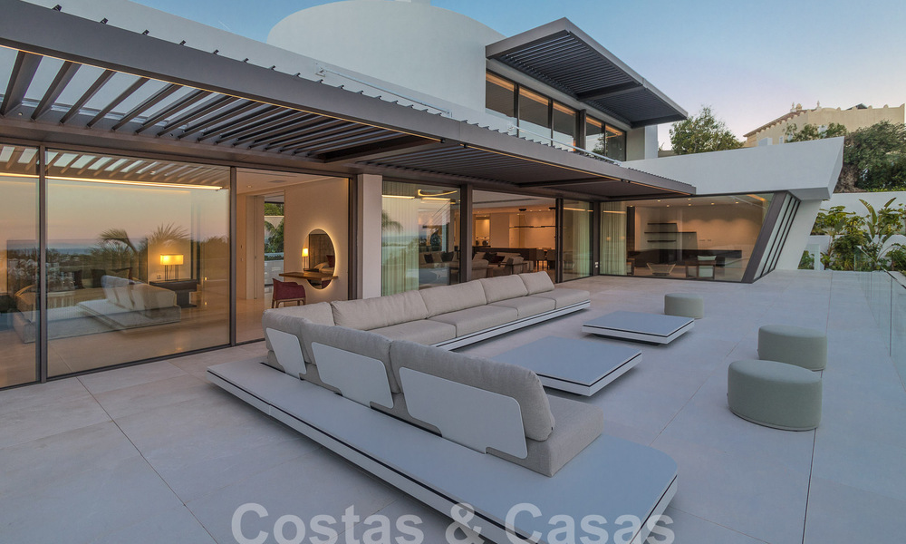Nueva y moderna villa de lujo de 6 dormitorios en venta con vistas al mar en La Quinta, Marbella - Benahavis 54316