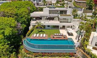 Nueva y moderna villa de lujo de 6 dormitorios en venta con vistas al mar en La Quinta, Marbella - Benahavis 54336 