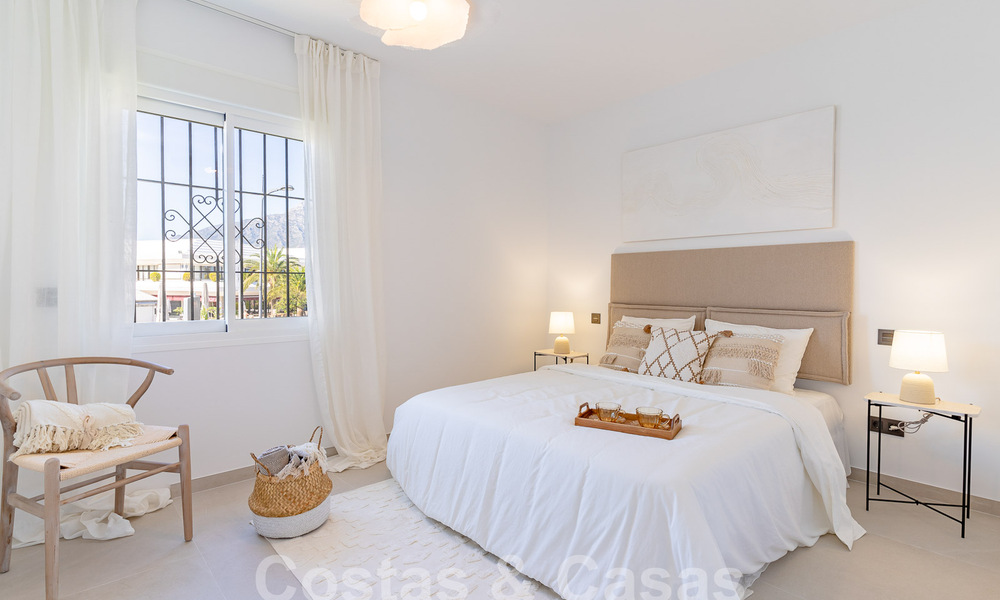 Encantador apartamento de lujo en venta con vistas panorámicas, a poca distancia de Puerto Banús en Nueva Andalucía, Marbella 54391