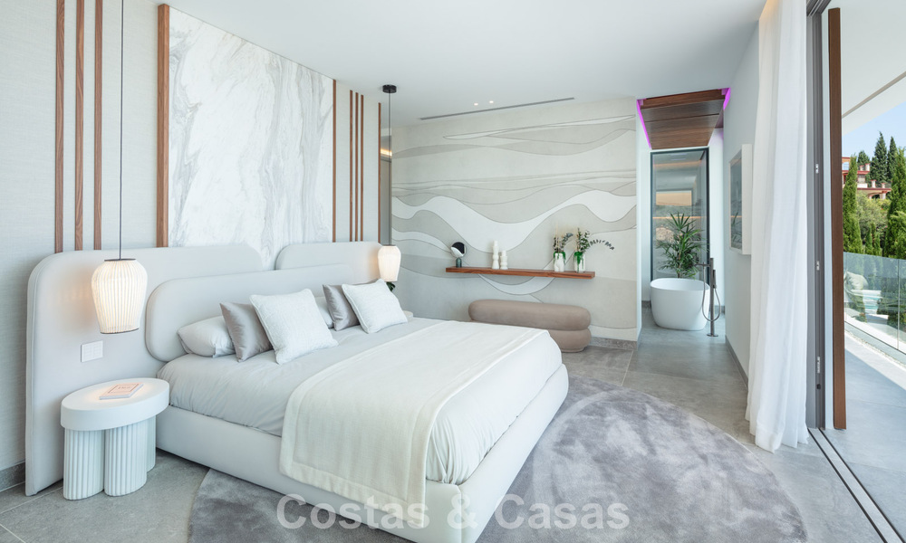 Impresionante y arquitectónica villa de lujo en venta con vistas abiertas al mar en una zona residencial elevada en las colinas de La Quinta en Marbella - Benahavis 54129