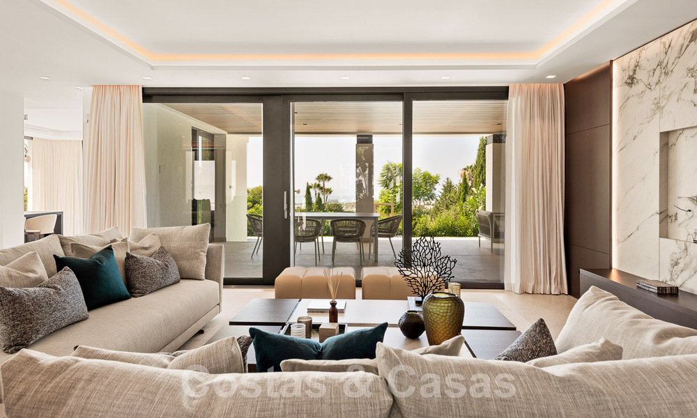 Nueva villa de diseño modernista en venta con vistas al campo de golf en un resort de golf, Marbella - Benahavis 55496
