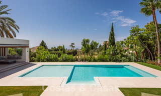 Nueva villa de diseño modernista en venta con vistas al campo de golf en un resort de golf, Marbella - Benahavis 55511 