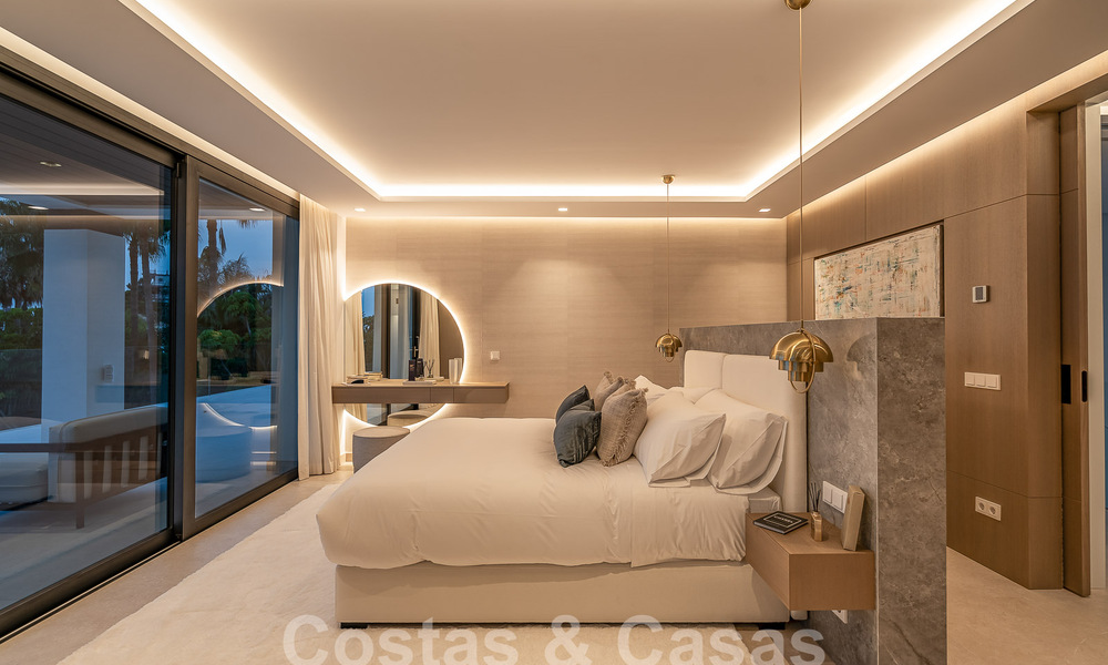 Nueva villa de diseño modernista en venta con vistas al campo de golf en un resort de golf, Marbella - Benahavis 55519